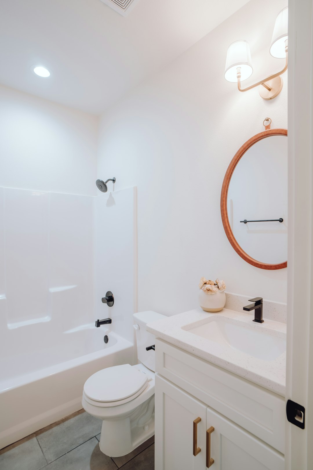 a-bathroom-with-a-toilet-sink-and-bathtub-h8esbtszims